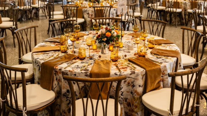 View of tables arranged nicely and lights over them dangling 